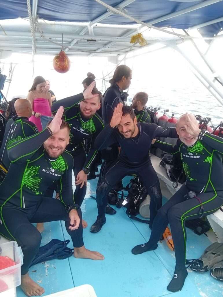 Triton Diving divers on the boat before the bull shark dive – photo © Iván García (@Spino_uwphoto)